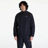 Conjunto Nike x NOCTA Woven Track Preto