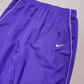 Conjunto Supreme x Nike Track Roxo