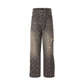 Calça Louis Vuitton Distressed Monogram Jeans