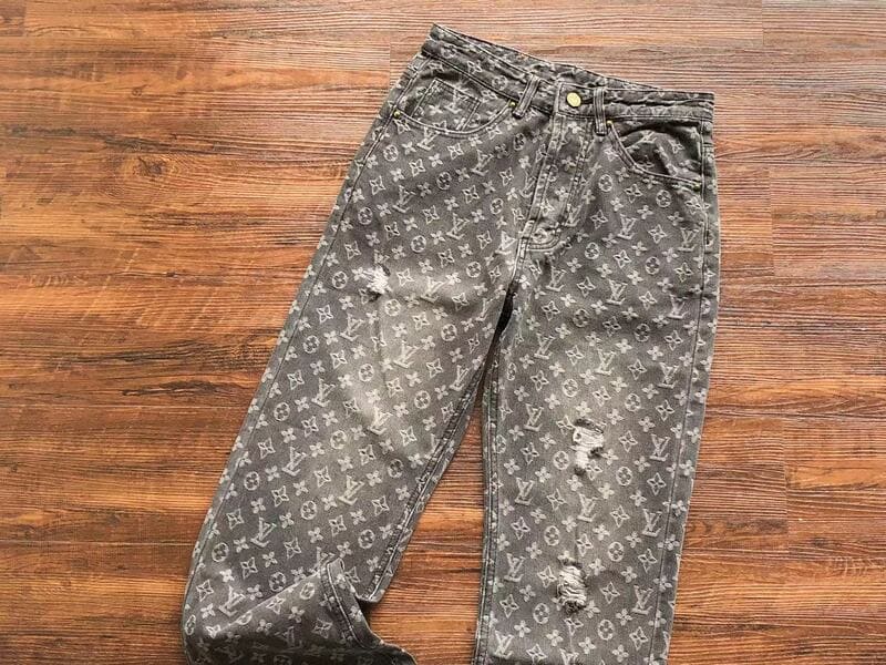 Calça Louis Vuitton Distressed Monogram Jeans